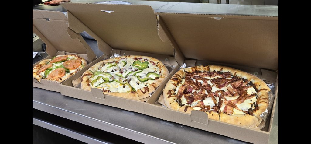 Presto Pizzeria Trois pizzas en boîtes Presto Pizzeria Trois pizzas en boîtes